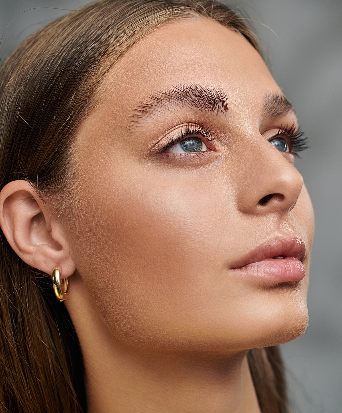 Close-up portrait of a woman with natural makeup.