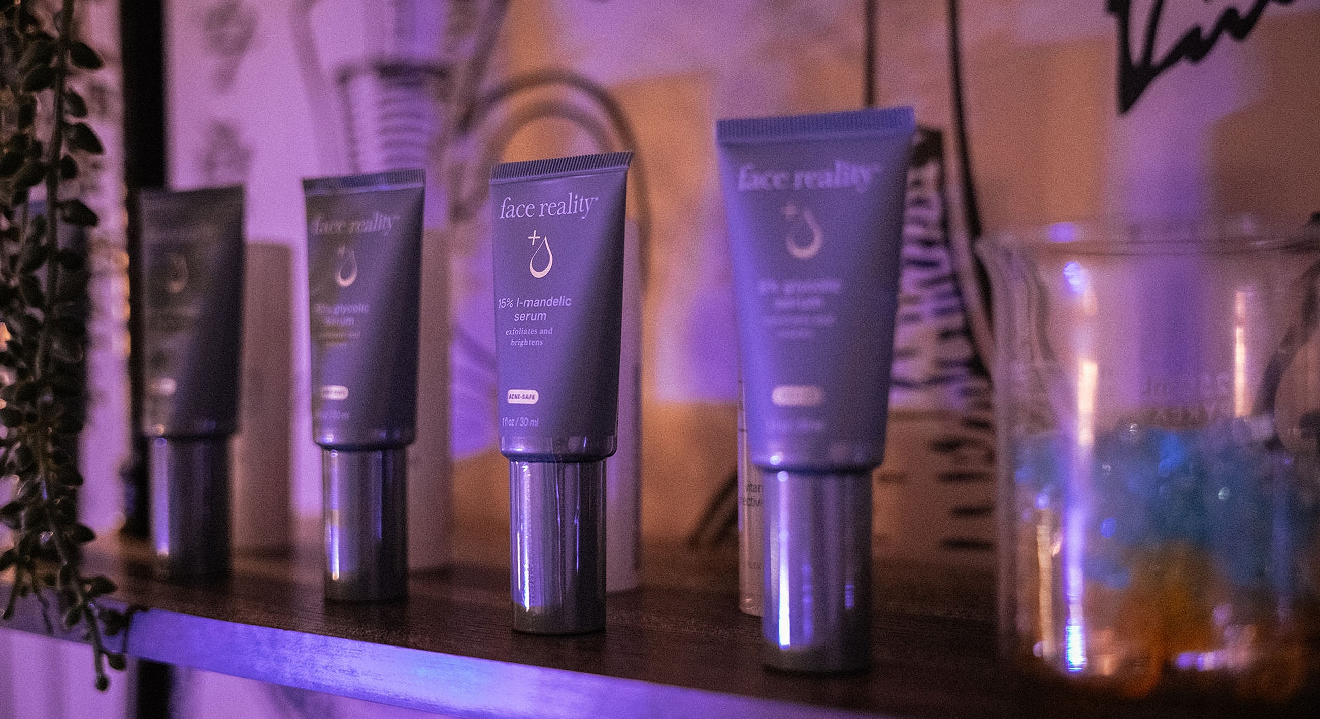 Face reality skincare products on a shelf.