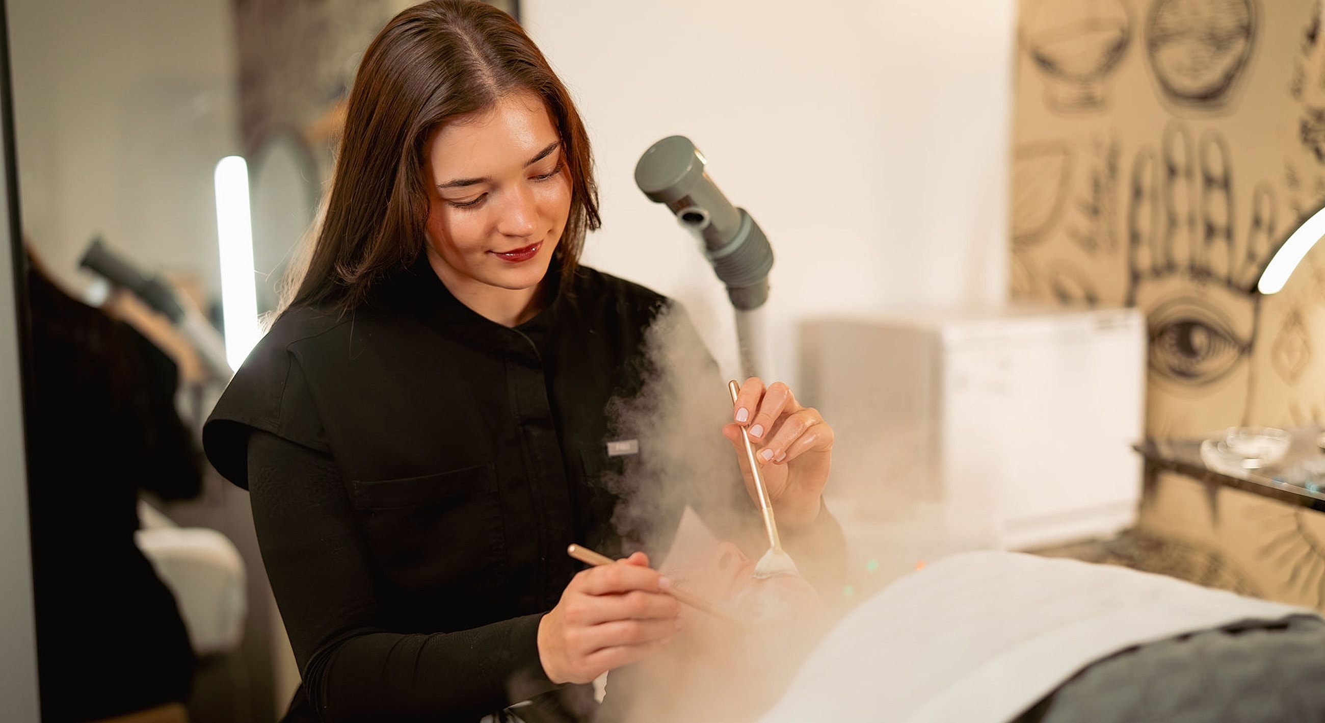 Beauty treatment with steam and facial application.